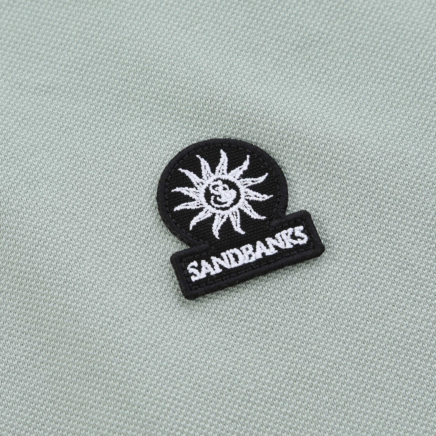 Sandbanks Badge Logo Polo Shirt in Sage Logo