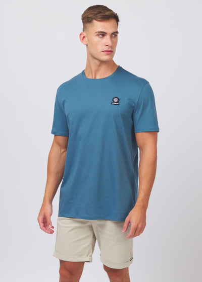 Sandbanks Badge Logo T Shirt in Teal Model