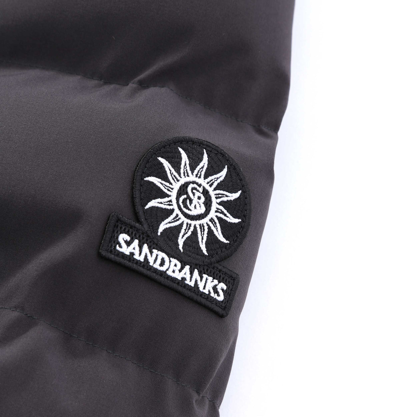 Sandbanks Banks Puffer Jacket in Charcoal Logo